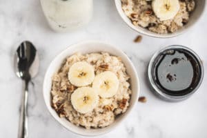 Banana Walnut Oatmeal in a bowl with banana slices on top