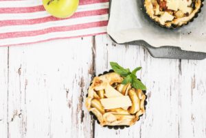 Cheddar Apple Tarts with Apricot-Mint Glaze garnished with mint