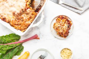 Harvest Lasagna with a piece of swiss chard on the side