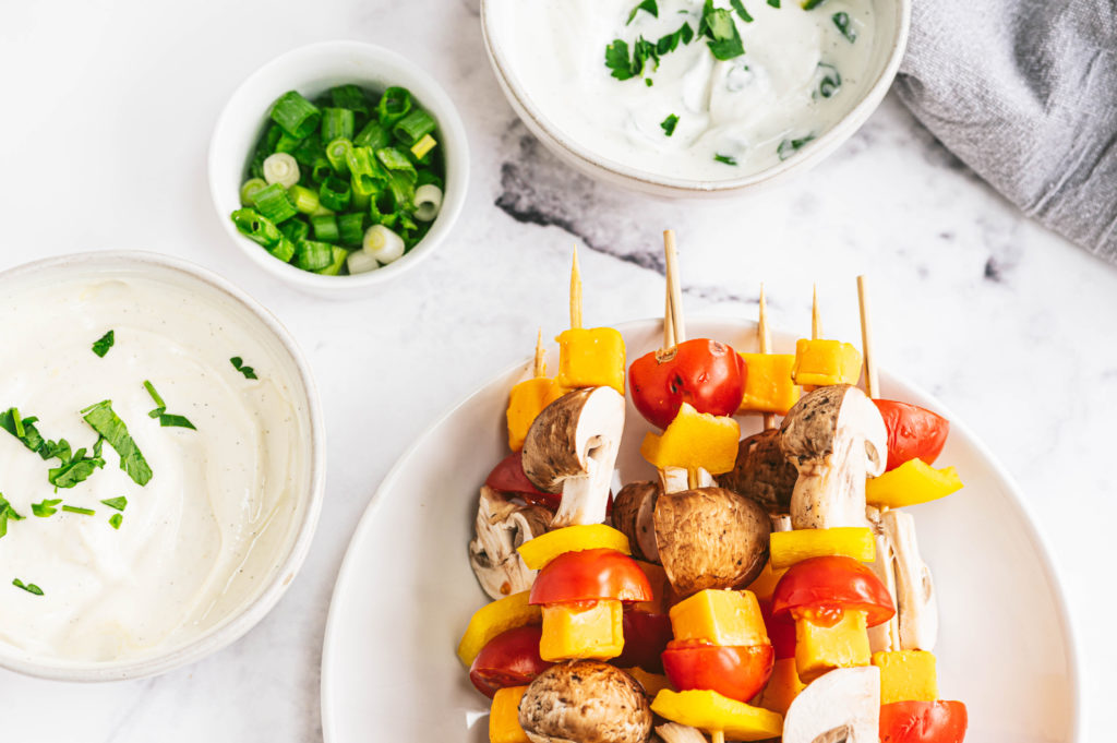 Salad Skewers with Honey Mustard and Cilantro Lime Yogurt Dressings are pictured