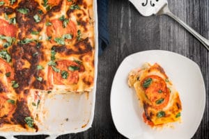 Tomato and Spinach Lasagna on a white serving dish