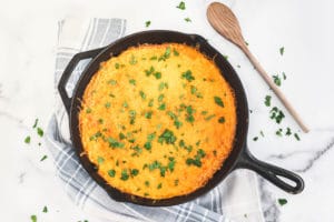 Spoon Bread in a cast iron skillet