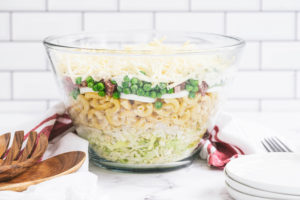 Make-Ahead Eight Layer Salad in a large glass bowl