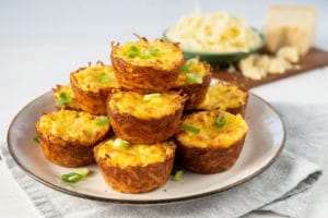 Scrambled Eggs Hash Browns Cups piled high on a white plate
