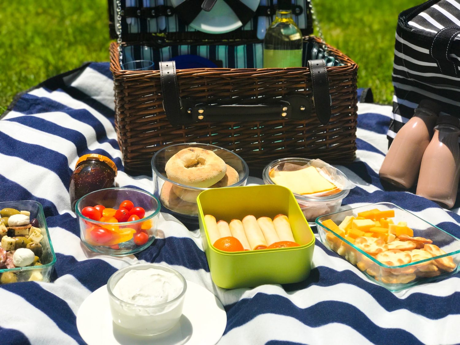 beautiful picnic spread on a striped blanket