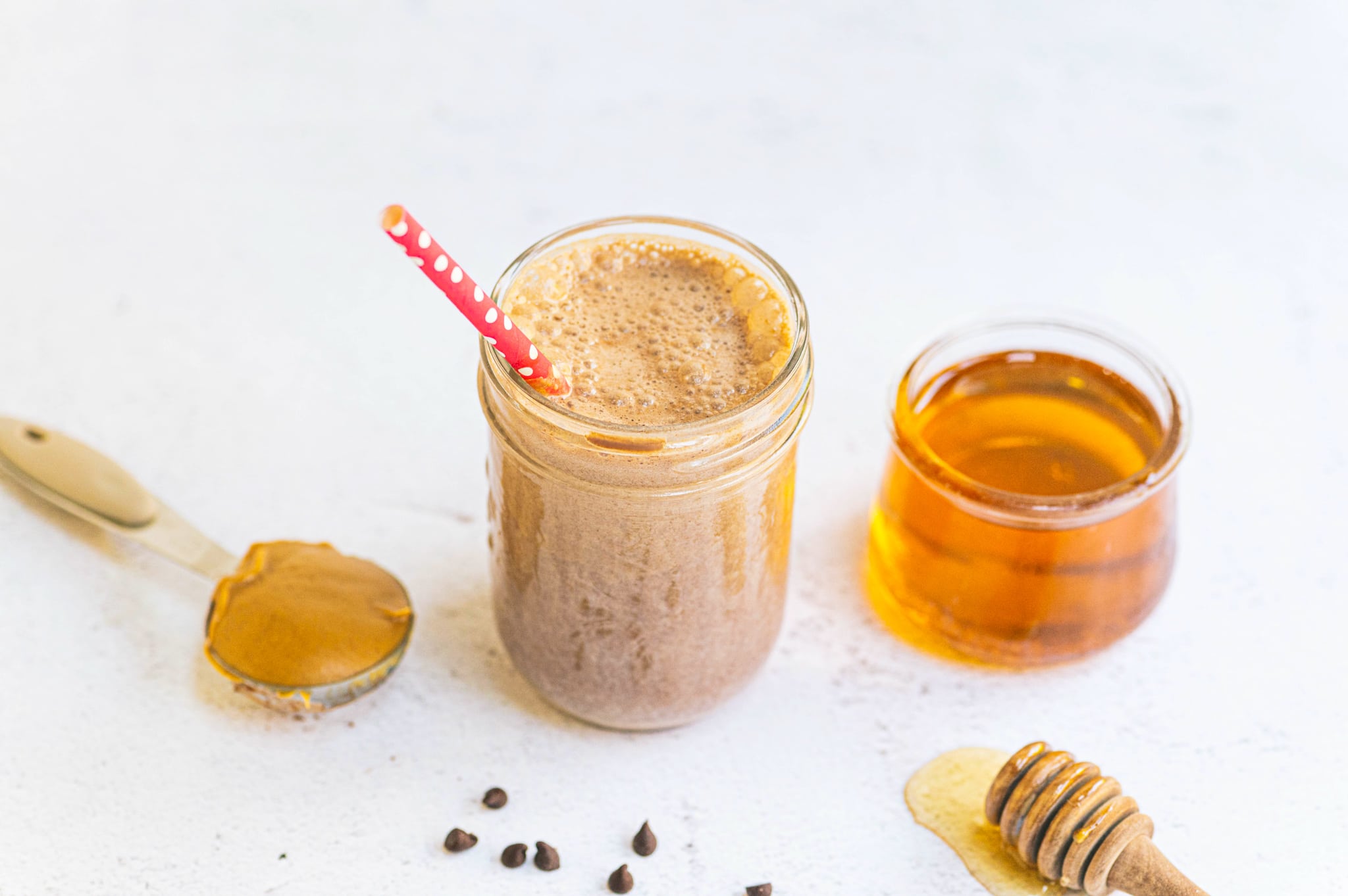 peanut butter chocolate milk in a small mason jar