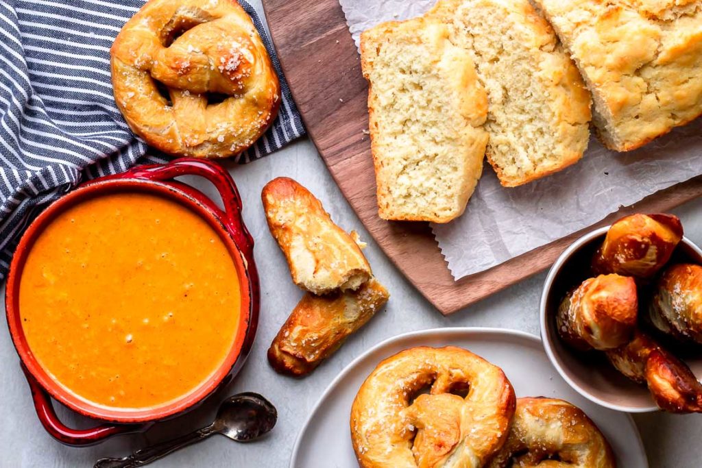 cheese dip, pretzels and bread