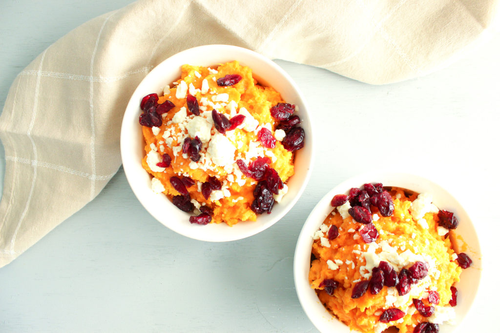feta and cranberries on top of mashed sweet potatoes